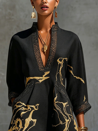 Nieves | Vestido corto estampado en negro y dorado con escote en V y encaje de crochet